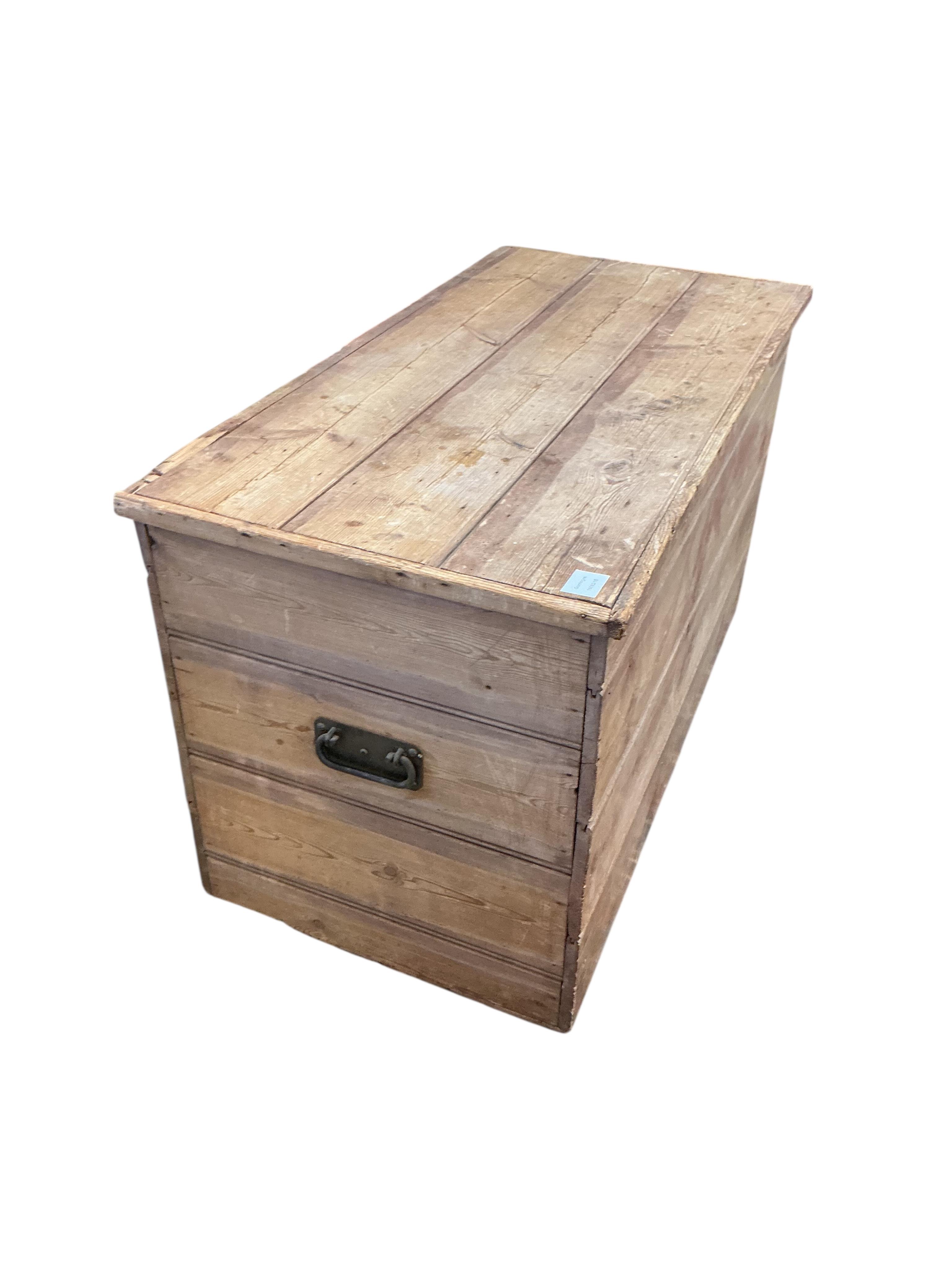 A Victorian pine trunk, width 105cm, depth 53cm, height 59cm
